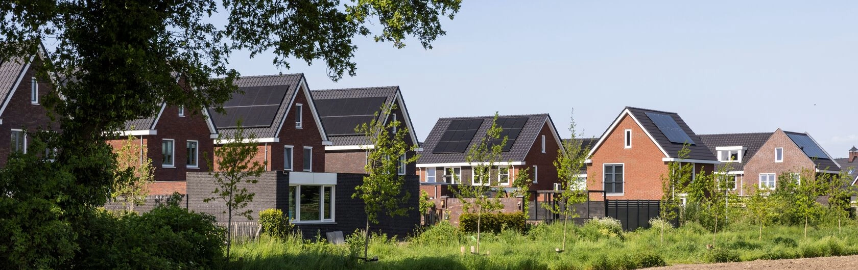 Regionale Fördermittel Hamburg: Viele Häuser an einem Fluß gelegen symobilisieren das.